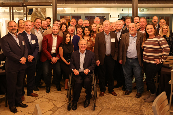 Photo of TXTA members with Gov Abbot