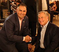 Photo of TXTA members with Gov Abbott